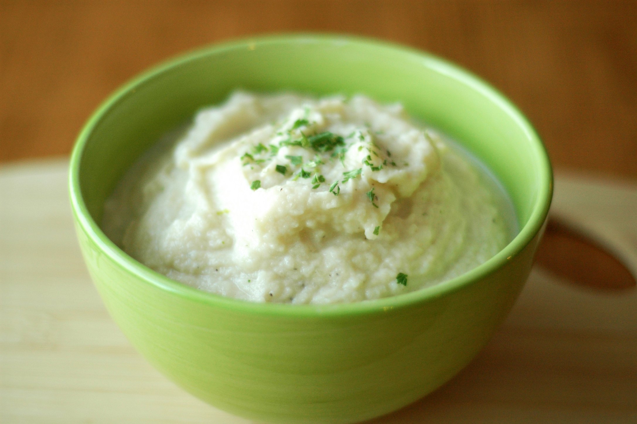 Slow Cooker Simple Whipped Cauliflower in green bowl