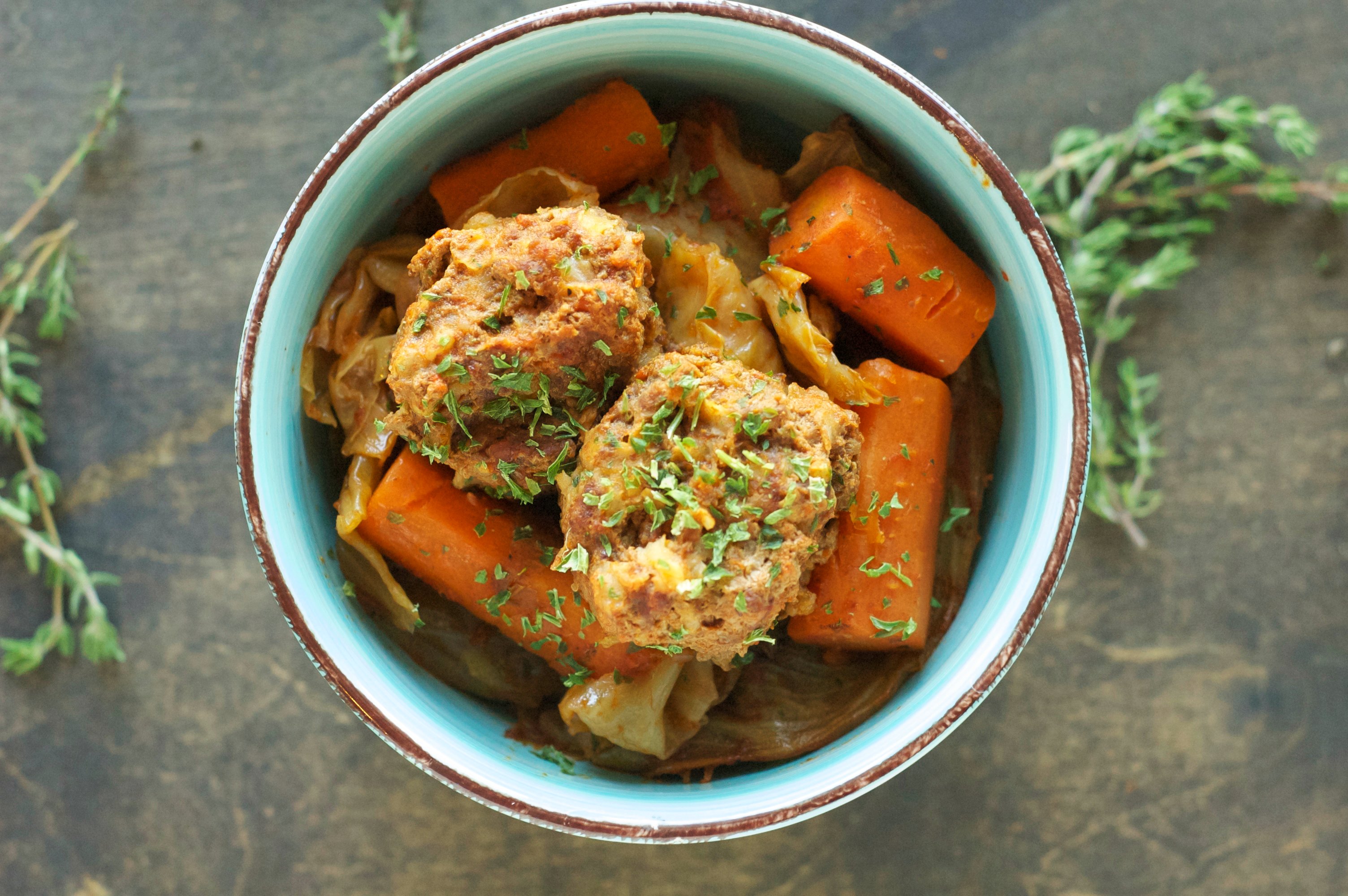 top view of meatballs, carrots and cabbage 