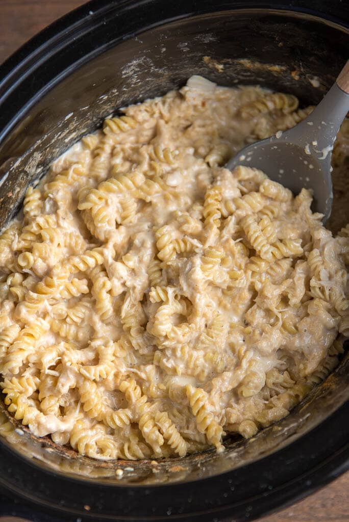 mac and cheese in black slow cooker