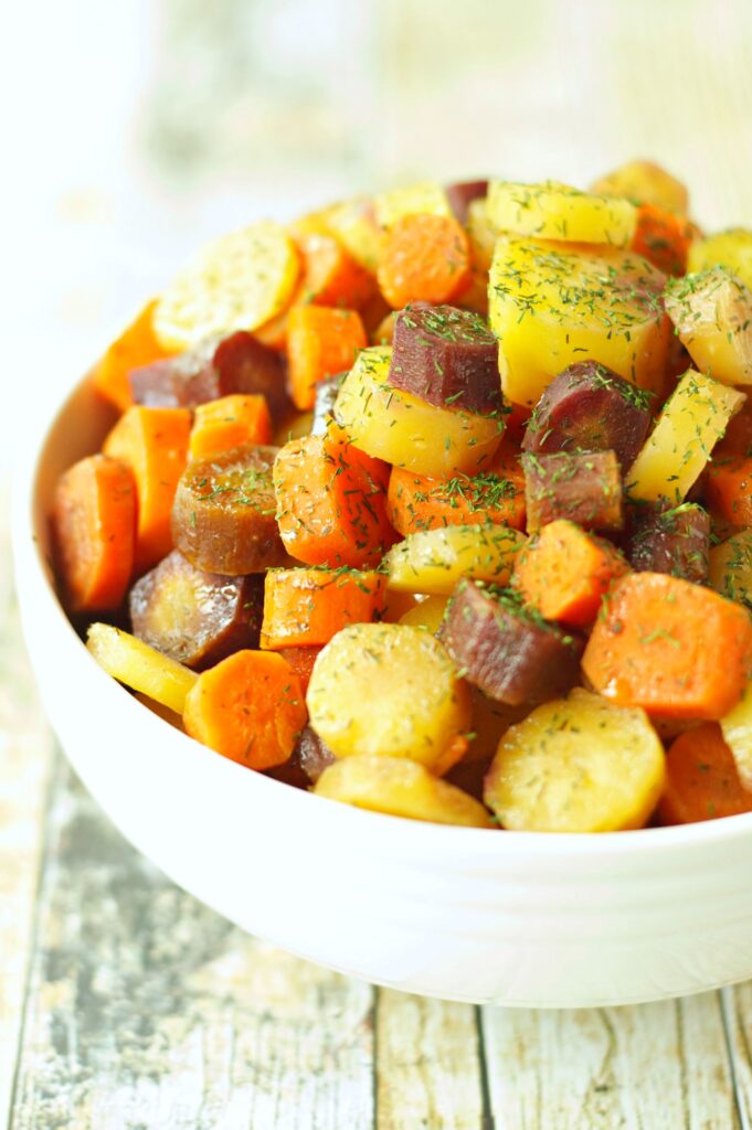 Slow Cooker Carrots with Honey Butter Sauce in white bowl