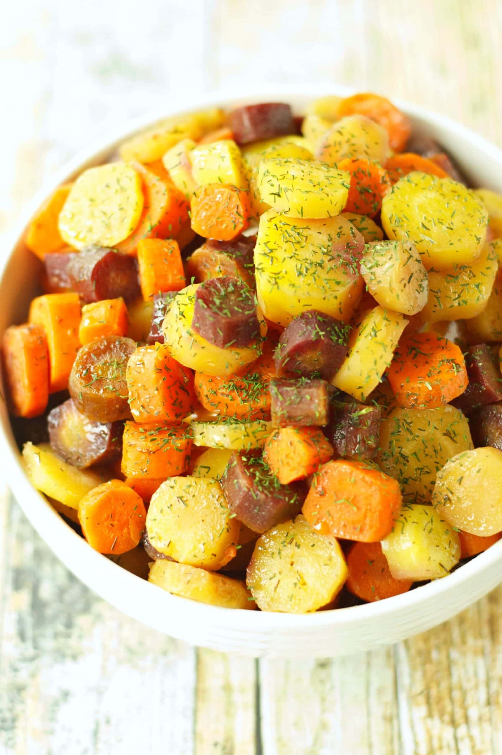 Slow Cooker Carrots with Herbed Honey Butter Sauce - Slow Cooker Gourmet