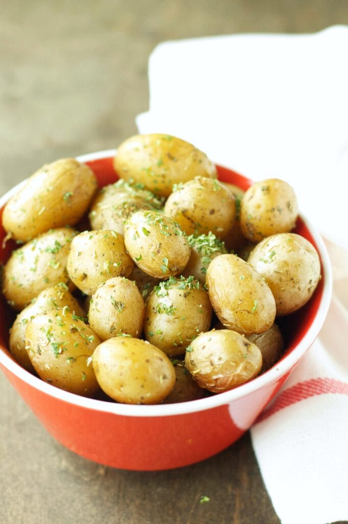Slow Cooker Herbed Baby Potatoes in red bowl