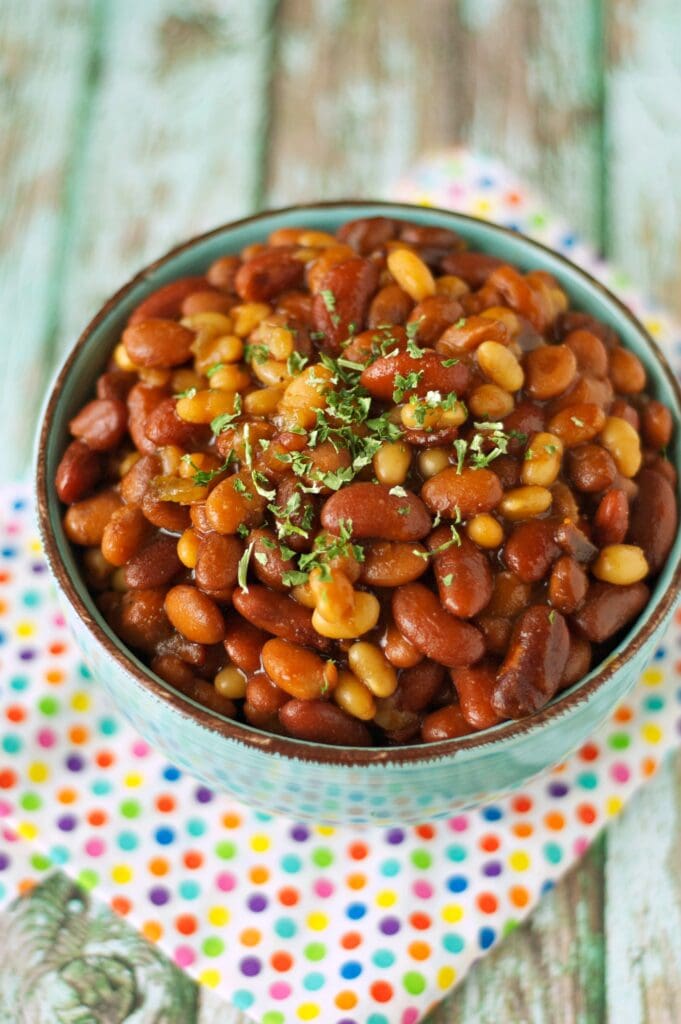 Slow Cooker Honey BBQ Baked Beans in green bowl