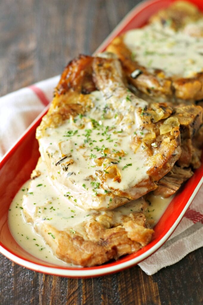 Slow Cooker Pork Chops with Creamy Herb Sauce