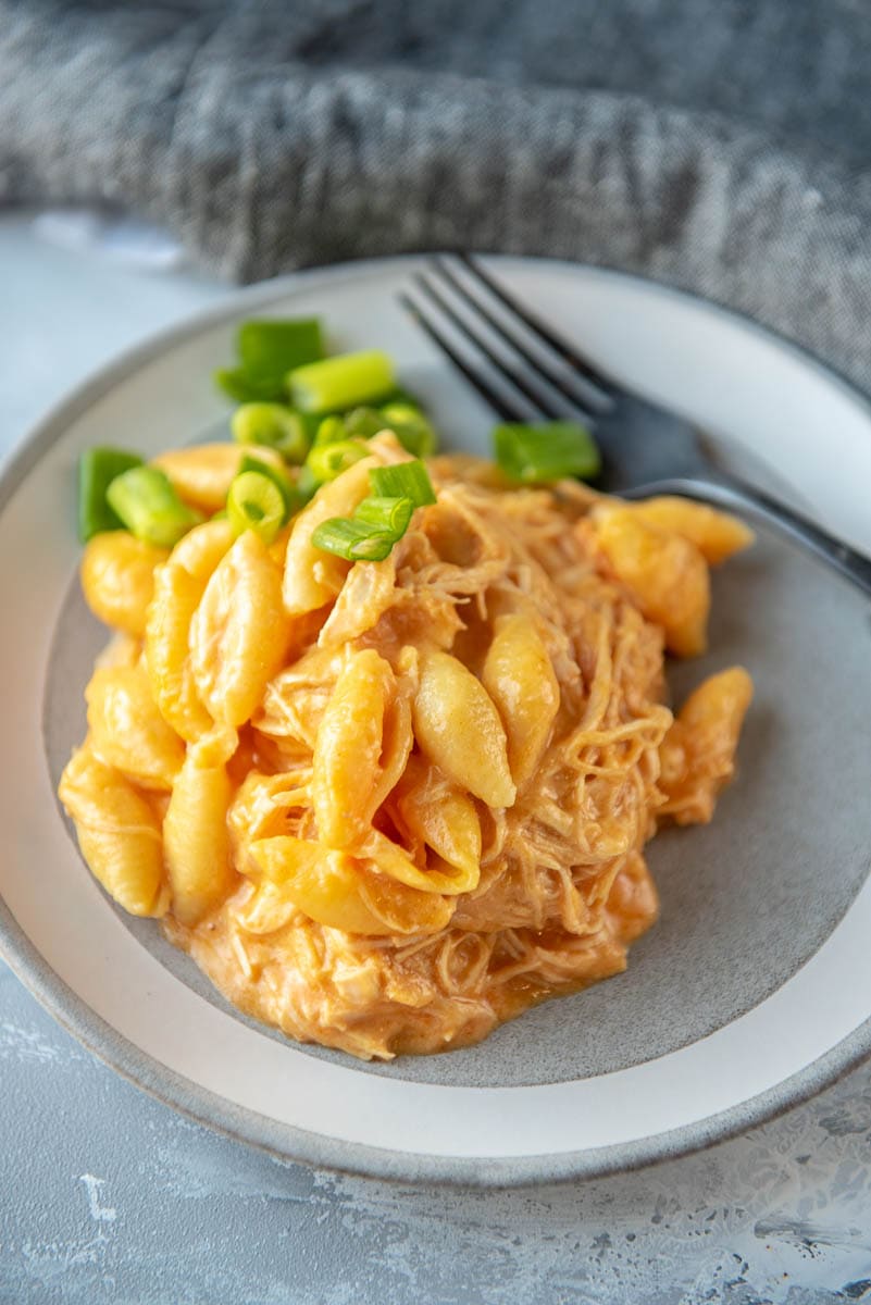gray plate with slow cooker buffalo chicken Mac and cheese