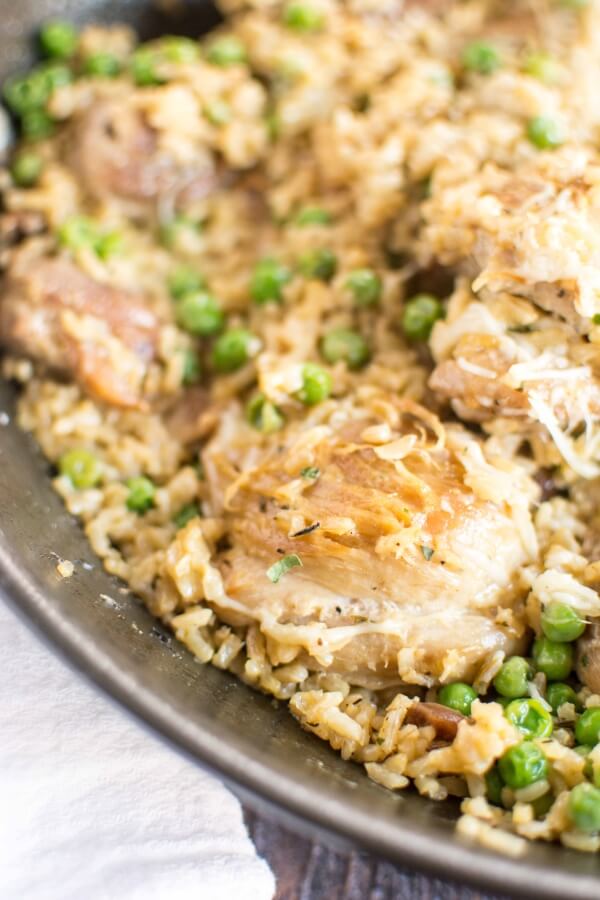 chicken and rice with peas in skillet