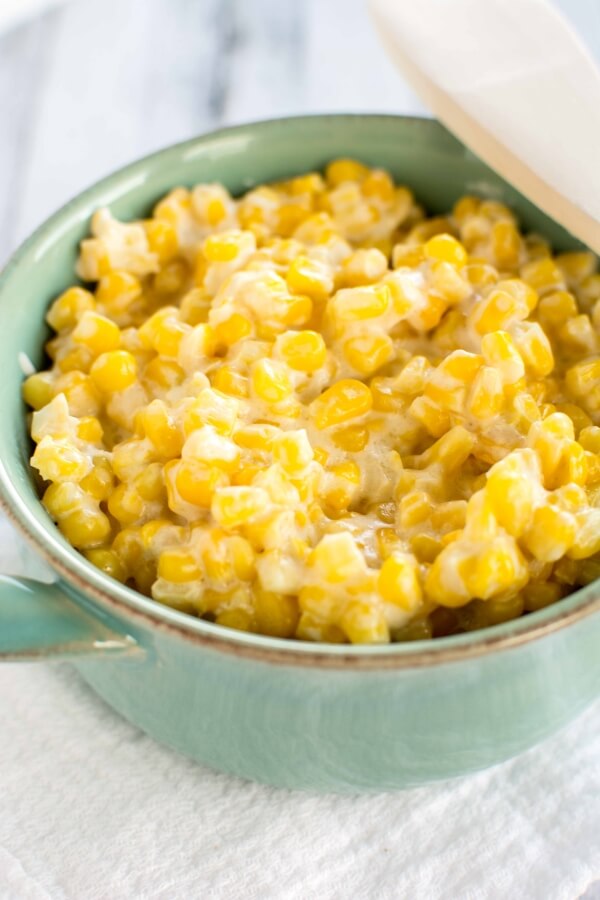 green container with cream cheese corn