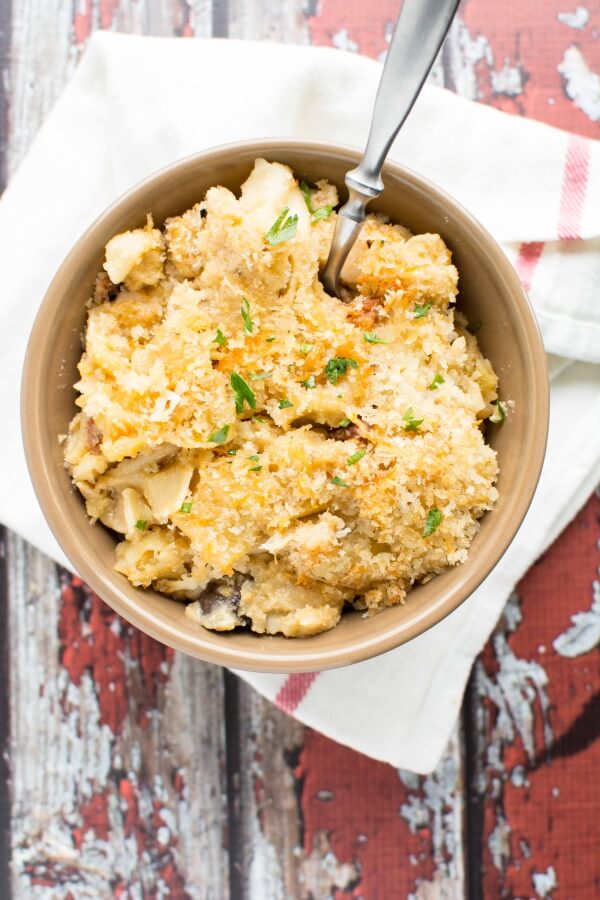 five cheese chicken bacon pasta in brown bowl with spoon