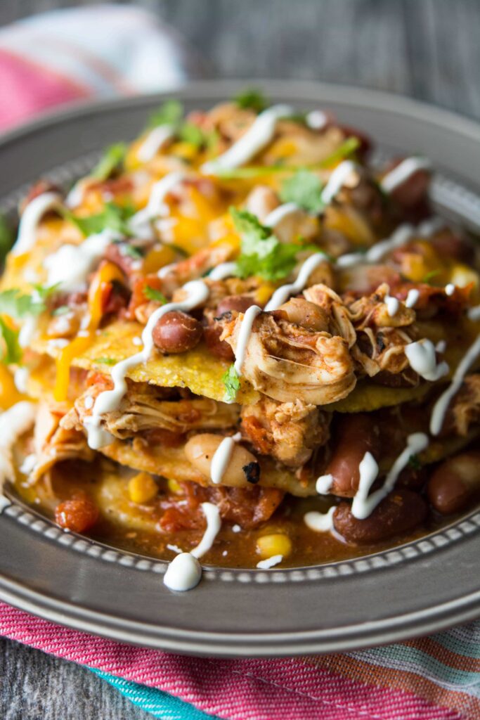 Slow Cooker Mexican Chicken Chili Tostada Stacks