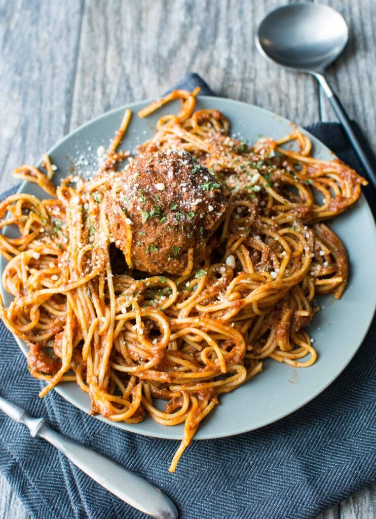 Slow Cooker Spaghetti and Meatballs on blue plate