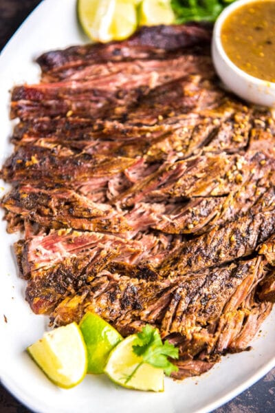 Slow Cooker Carne Asada is a simple way to make delicious tacos any night of the week! This tender delicious beef has just the right seasonings!