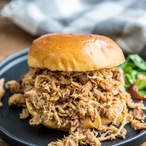 How to make The Best Slow Cooker Pulled Pork! Everyone is sure to love this amazing slow cooker pulled pork.  The perfect blend of spices make it tender and bursting with flavor!