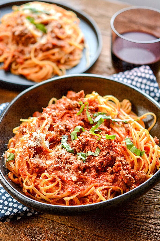 No need to stand over the stove while stirring all day long! Impress your family or dinner guests with this delicious Slow Cooker Bolognese that's so easy to make while still being so full of rich flavors.