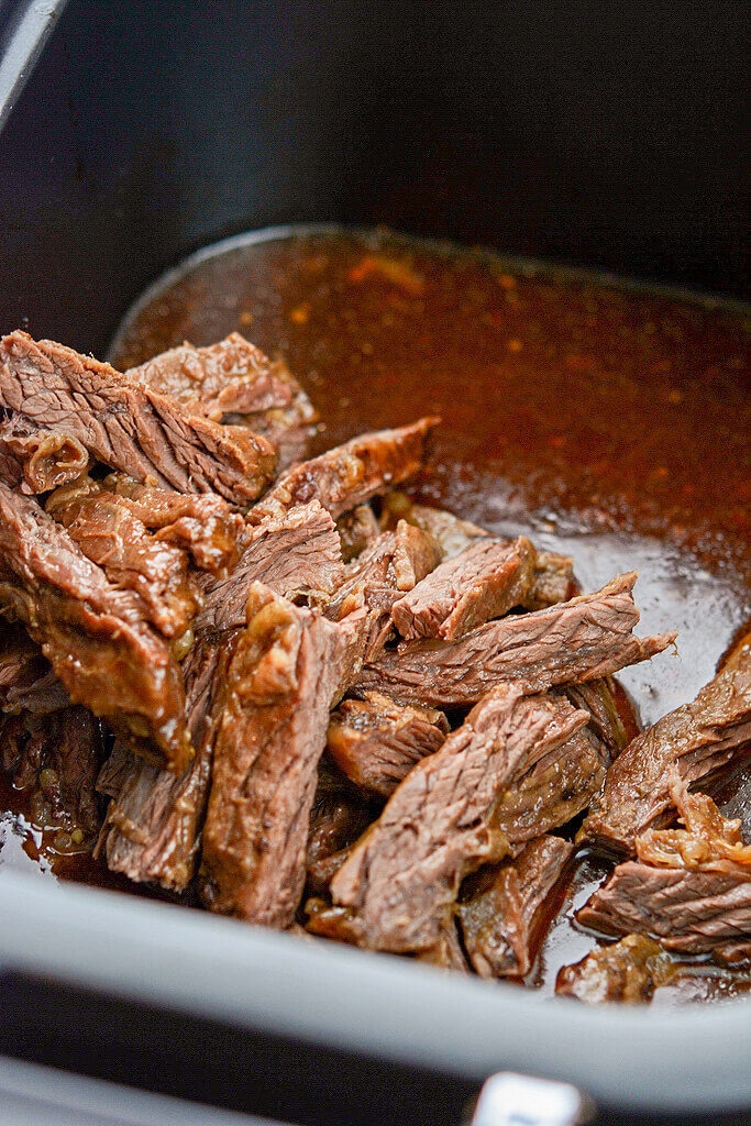 No need to waste money eating out! This Slow Cooker Mongolian Beef is so easy to make, so fresh and so much better than take-out!