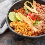When you're ready to take your dinners from boring to amazing, these Slow Cooker Pork Enchilada Bowls will make it easy!