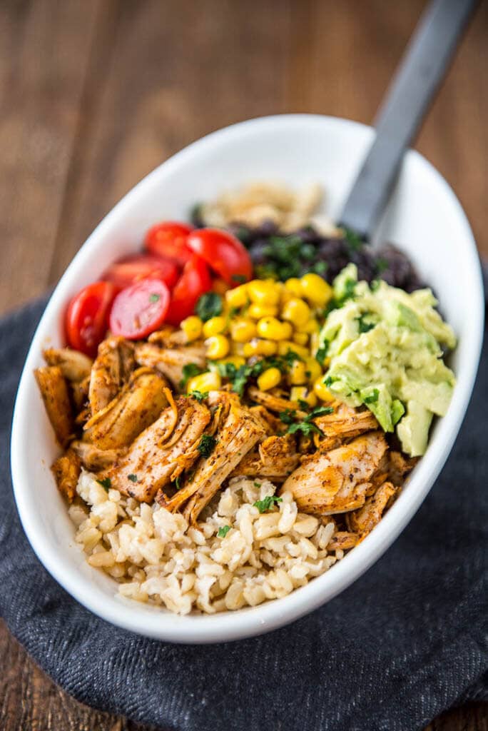 Make this Meal Prep Whole Chicken and be a Meal Prep Rock Star! Create Easy and Delicious Chicken Burrito Bowls!