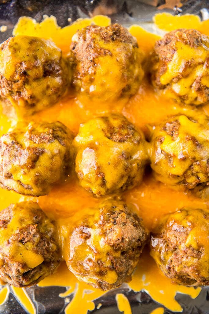 Slow Cooker Cheeseburger Meatball Sliders are the perfect way to get your burger fix without all the work of firing up the grill! So easy and deliciously tasty!