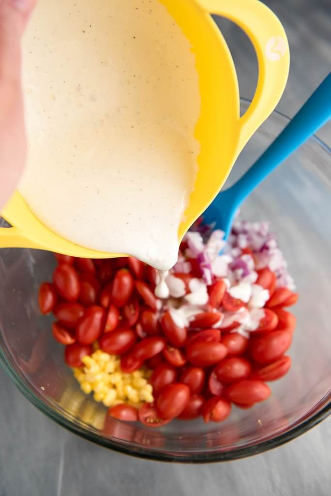 The perfect side dish all summer long! Corn and Tomato Salad is so simple to prepare, so fresh and always a hit!