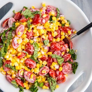 The perfect side dish all summer long! Corn and Tomato Salad is so simple to prepare, so fresh and always a hit!