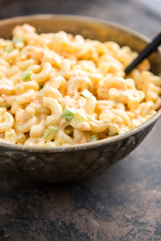 Hawaiian Macaroni Salad is a simple and basic side dish that's anything but boring. Just a few ingredients and you have a creamy simple pasta side dish for any meal.