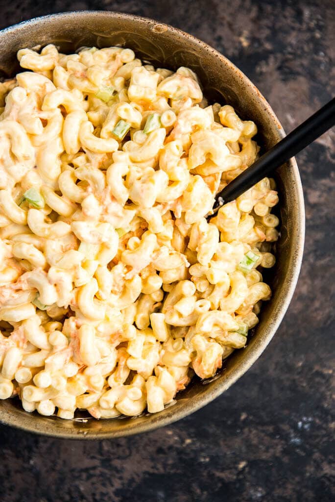 Hawaiian Macaroni Salad is a simple and basic side dish that's anything but boring. Just a few ingredients and you have a creamy simple pasta side dish for any meal.