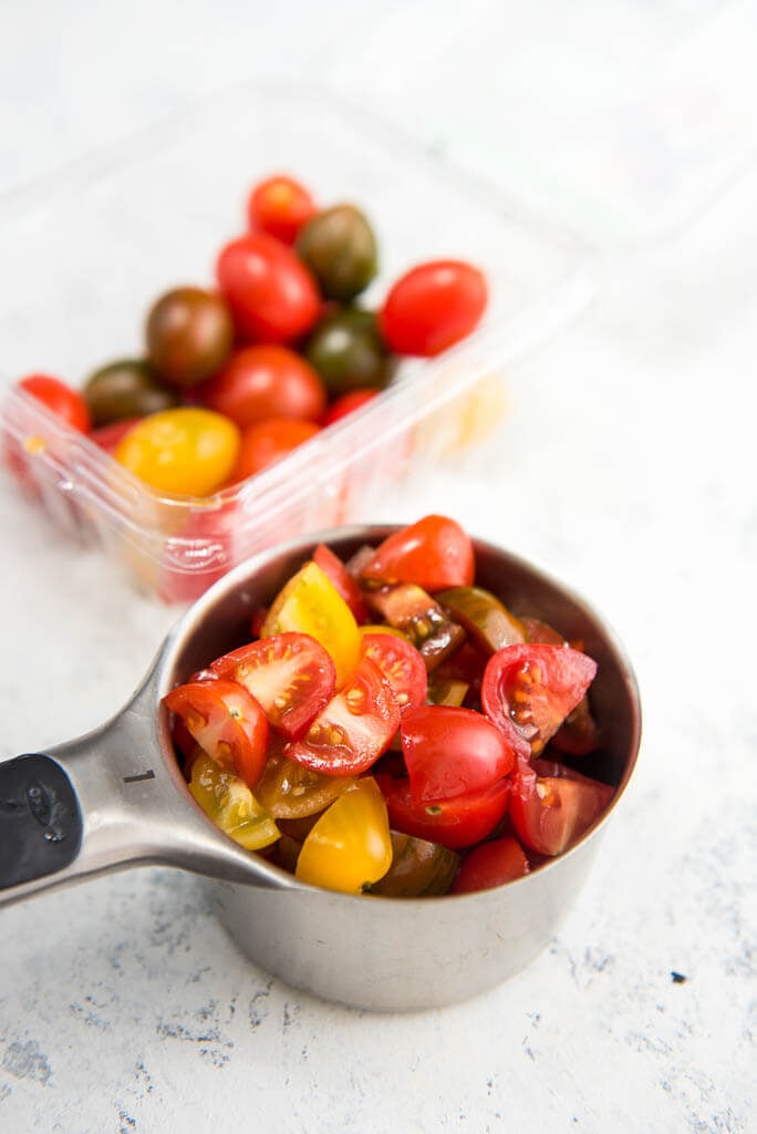 Saltine Cracker Salad may sound unusual but is so easy and delicious! Hard boiled eggs, saltine crackers, tomatoes and mayo form the base of your new favorite side dish!