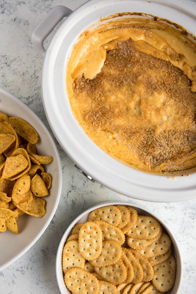 Slow Cooker Jalapeño Dip is a simple way to make your favorite appetizer without all the fuss. Delicious peppers, sweet jam and cream cheese perfect for dipping your favorite chip.