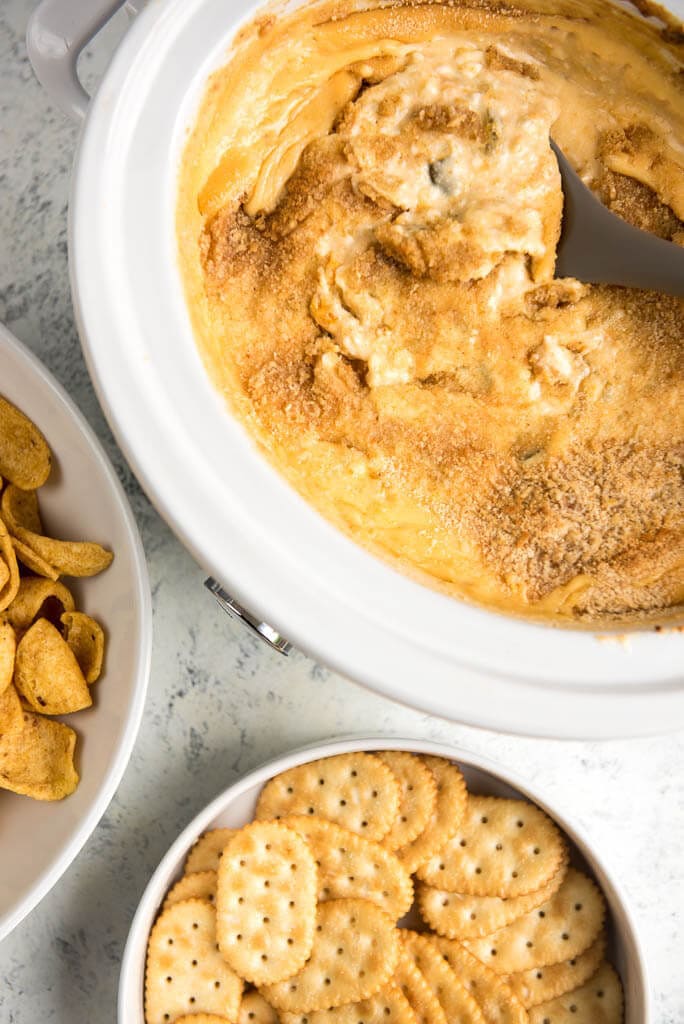 Slow Cooker Jalapeño Dip is a simple way to make your favorite appetizer without all the fuss. Delicious peppers, sweet jam and cream cheese perfect for dipping your favorite chip.