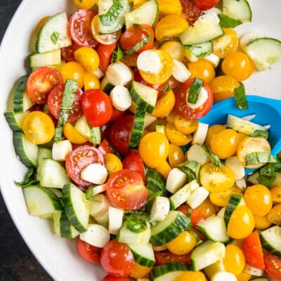 Looking for an easy lunch box idea for work or school? This Cucumber Tomato Salad with Mozzarella is the perfect solution! You can even include in your meal prep plan and eat delicious all week!