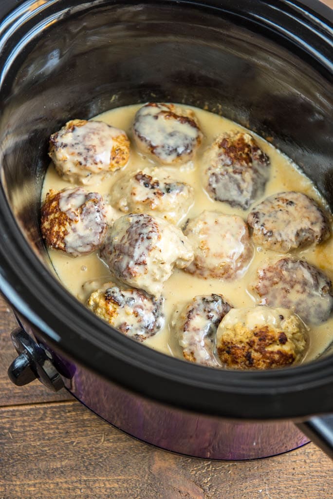 A flavorful seasoning blend makes these Slow Cooker Chicken Meatballs with Cream Sauce a quick and delicious weeknight meal idea!