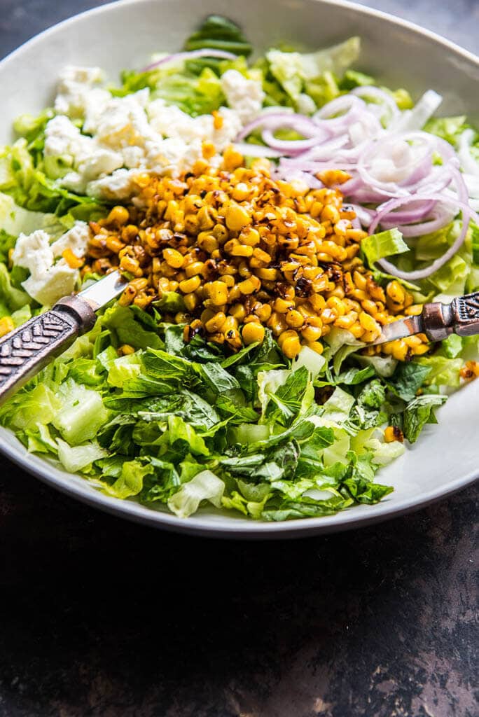 For a simple side dish nothing beats this Roasted Corn Chopped Salad with Lemon Vinaigrette! Less than 10 ingredients and done it minutes!