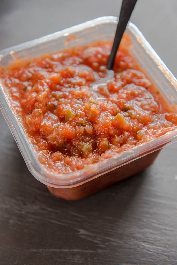 A container of fresh salsa for Slow Cooker Salsa Chicken