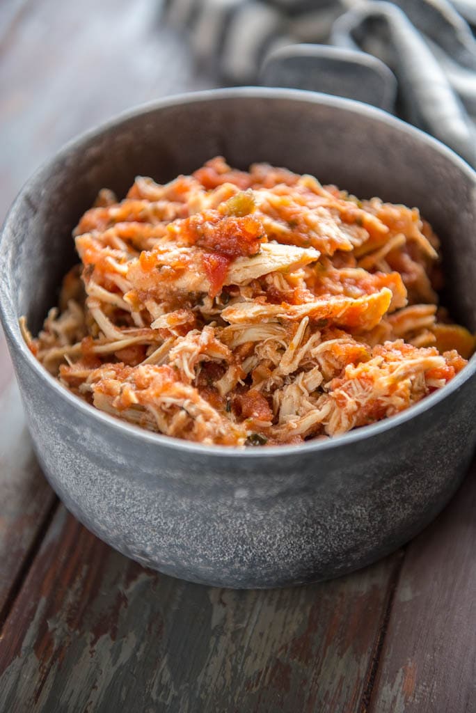 Shredded Slow Cooker Salsa Chicken in gray metal bowl