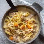 chicken noodle soup from the instant pot in a metal bowl