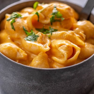 buffalo chicken Mac and cheese with shell pasta in gray metal bowl