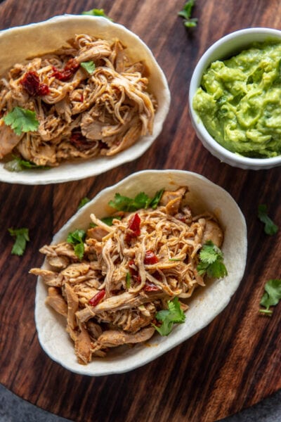 overhead view looking at beer braised chicken tacos with chipotle and cilantro