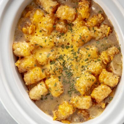 tater tot casserole in oval casserole slow cooker