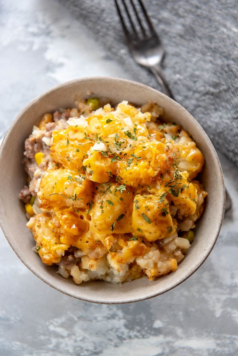 tater tot casserole in a gray bowl