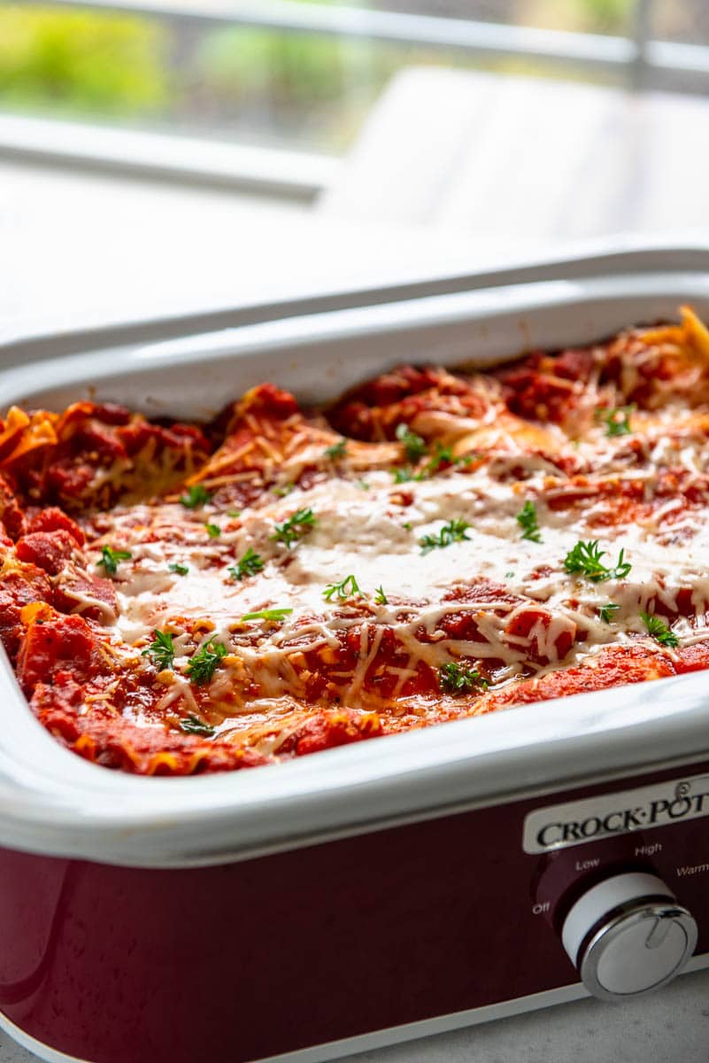 casserole slow cooker on counter with lasagna