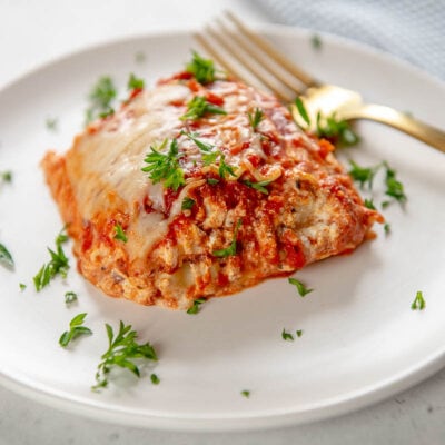 slow cooker cheese lasagna slice on white plate