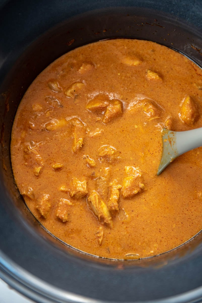 slow cooker filled with butter chicken