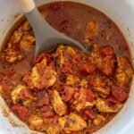 round slow cooker with moroccan chicken with tomatoes