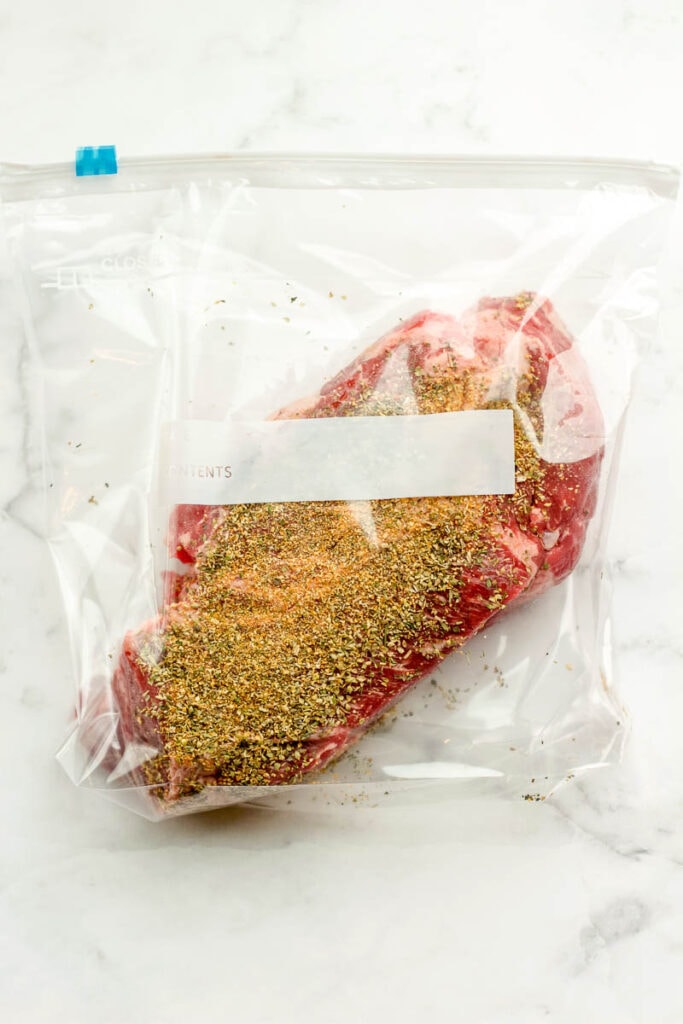 beef with seasonings in a freezer bag