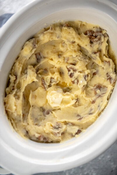 mashed potatoes in white slow cooker