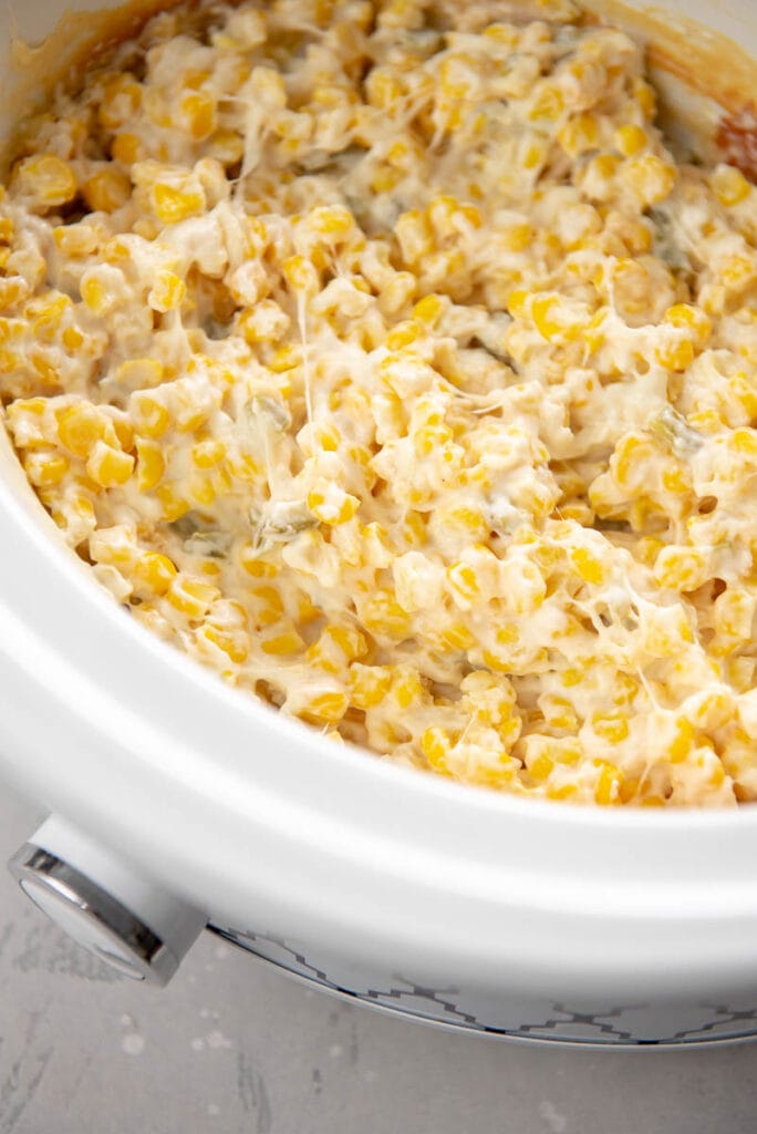 slow cooker filled with cheesy corn dip