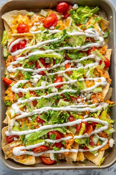 buffalo chicken nachos with ranch dressing drizzle