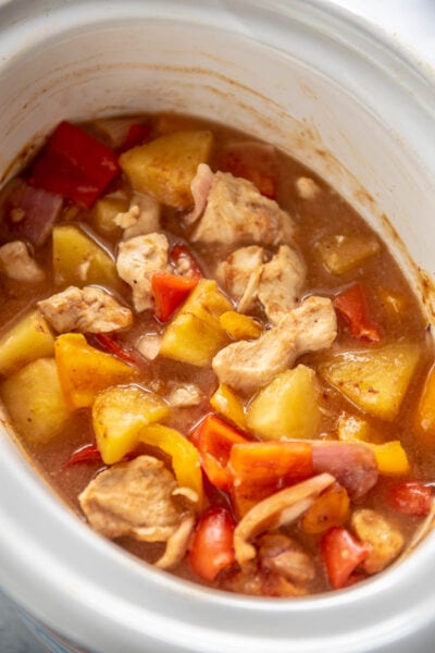 pineapple chicken in slow cooker ready to serve