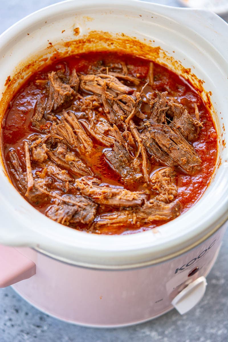 beef ragu cooking in the slow cooker
