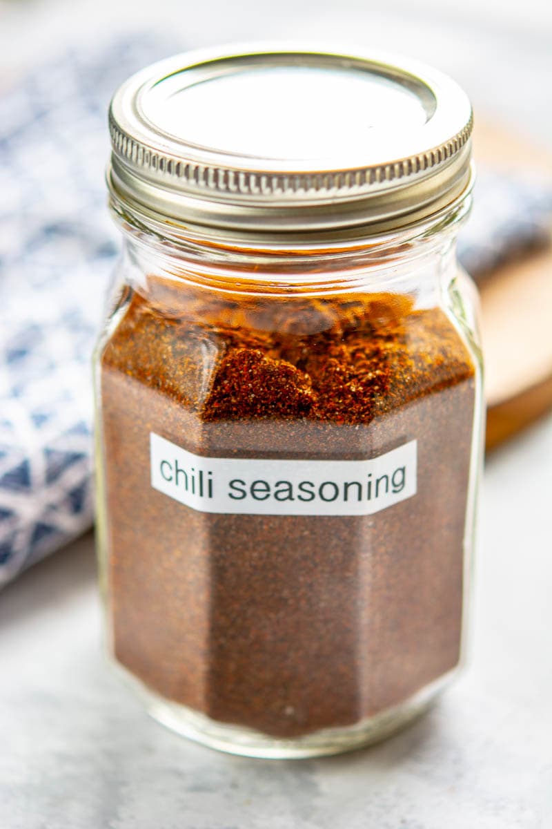 glass bottle of homemade chili seasoning