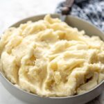 mashed potatoes in a gray bowl